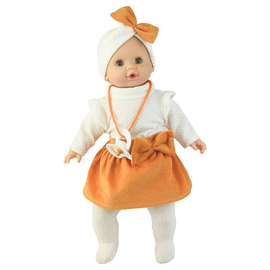 Puppe mit weißem Pulli und weißer Strumpfhose und einem orangenen Kord-Rock mit Schleife