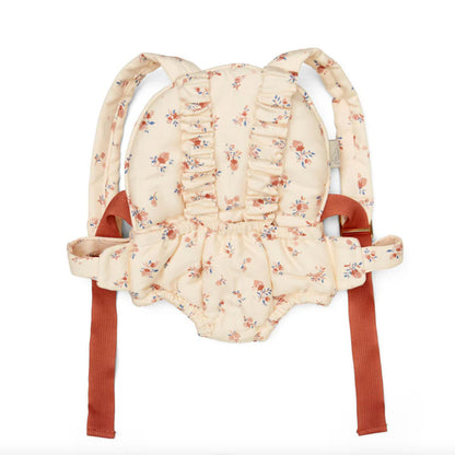 Puppentrage in beige mit zarten rostroten Blumen drauf und Rüschen