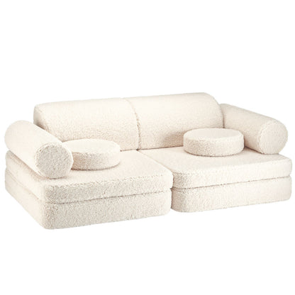 Hübsches Kindersofa aus Teddystoff in der Farbe creme. 9-teilig mit tollen Kissen. 