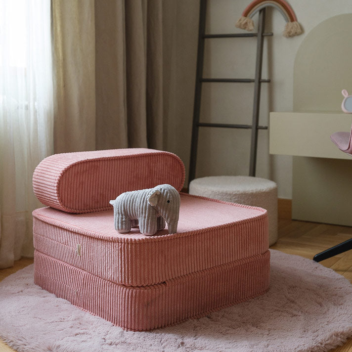 Flip-Spielsofa von Wigiwama in der Farbe rosa, als Cord-Variante